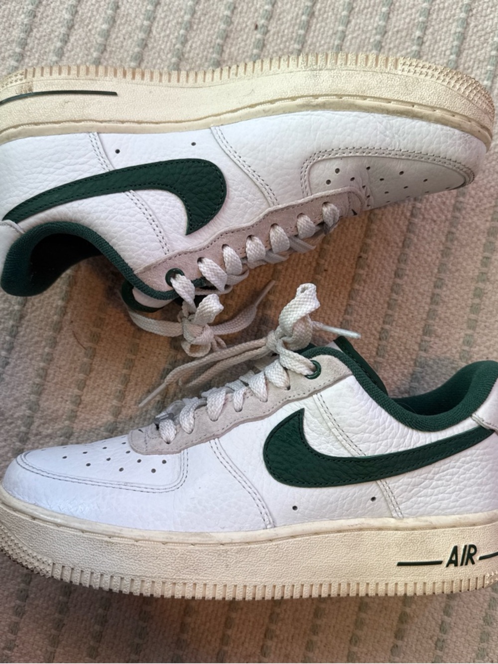Nike White Low-Top Sneakers with Dark Green Swoosh